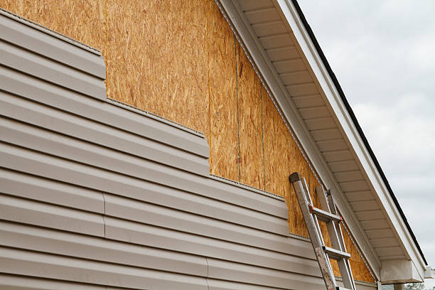 Professional Siding technician working in Sanford, CO